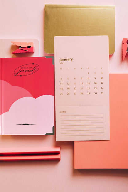 breakup journal on a desk with diary and calendar